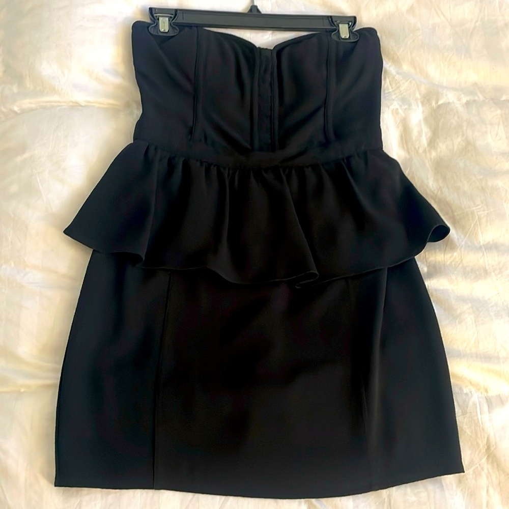 Short black strapless peplum dress
